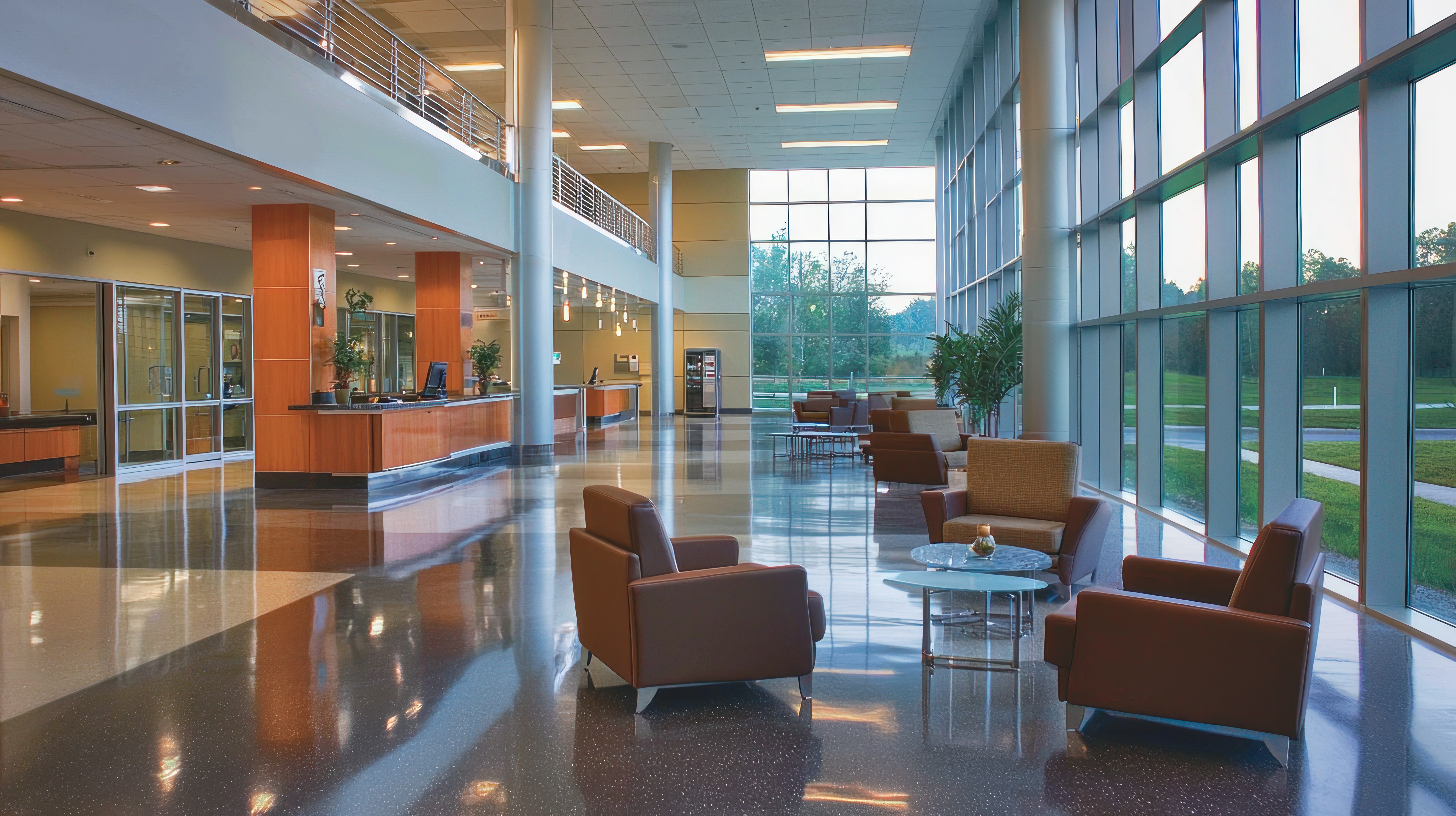 modern lobby with seating and large windows.